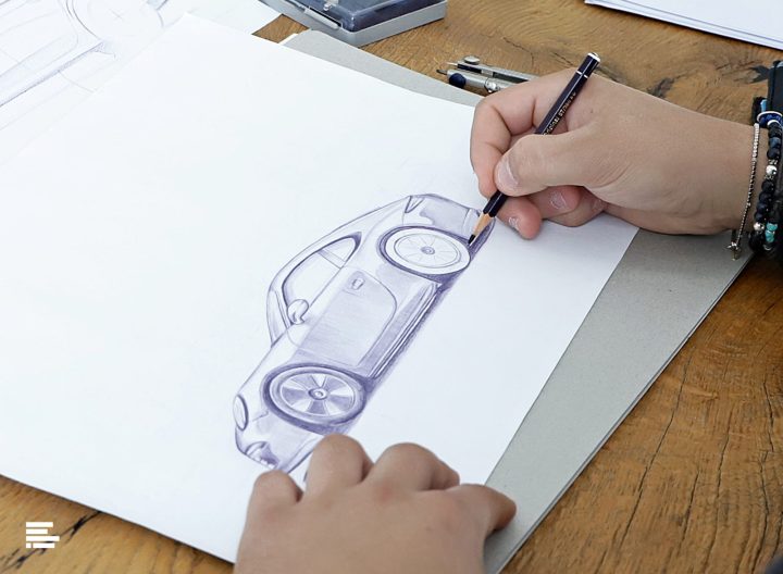 IAAD. IAAD. student sketching a car